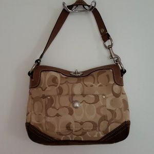 Brown emblem Coach purse